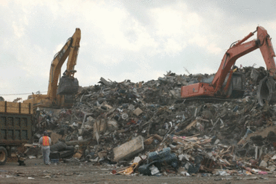 A hugh pile of debris from Hurricane Katrina.  Pile is over 30 feet high.
