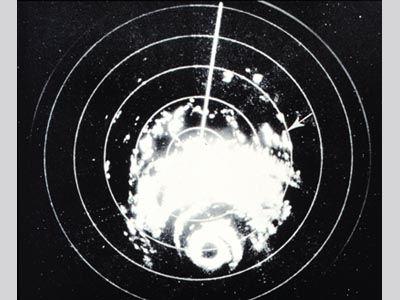A black screen with white areas depicting hurricane activity.