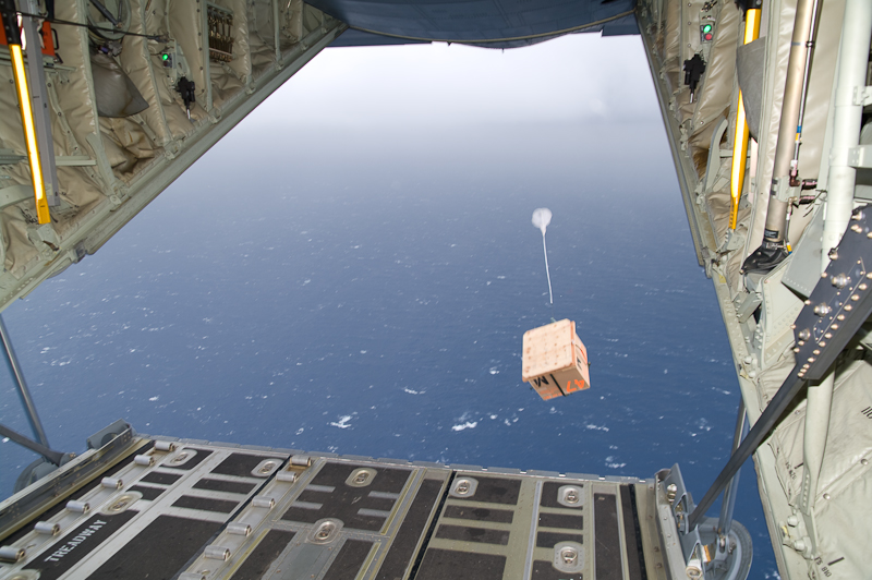 A Hurricane Hunters WC-130J aircraft drops an oceanic data buoy in advance of Hurricane Ike (2008).