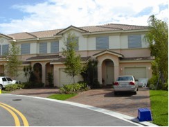 This photograph shows panel hurricane shutters installed on homes along the east coast of Florida.