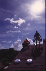Roof-top sensors being deployed on a Florida residence in advance of Hurricane Dennis (1999).